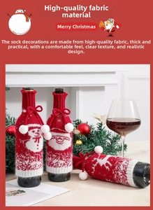 Detailed knit wine bottle cover with Santa and reindeer motifs for Christmas table decor