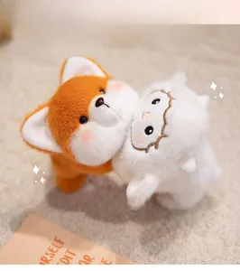 Close-up of plush fox and lamb stuffed toys featuring soft texture and embroidered details