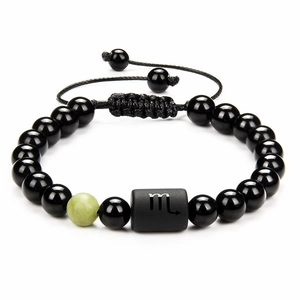 Detailed shot of Scorpio constellation black agate beaded bracelet with adjustable cord