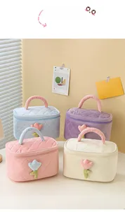 Quilted corduroy cosmetic bags with tulip charms in pastel blue, purple, pink and cream