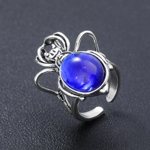 Gothic punk spider ring with deep blue gemstone and vintage silver adjustable band