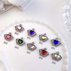 Macro view of multi-colored crown heart rhinestones for nail art and DIY jewelry