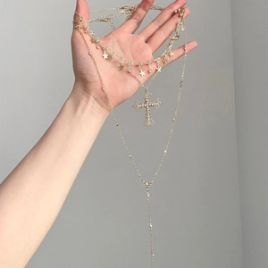 Vintage layered gold necklace set with star charms and crystal cross pendant for women