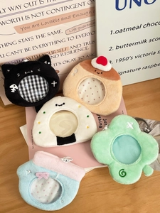 Detailed plush anime badge holders in diverse cute shapes with colorful patterns
