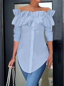 Detail of light blue off-shoulder shirt with ruffled layers and single-breasted front buttons
