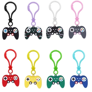 Set of eight colorful silicone game controller keychains with snap hooks in a grid layout