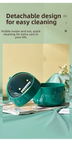 Close-up of detachable dinosaur trash can showing easy-to-clean split design and inner space