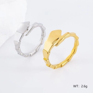 Bamboo-style stainless steel open rings in gold and silver finish on white background