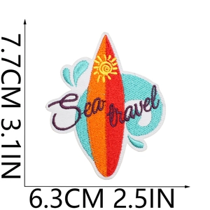 Detailed view of a surfboard embroidery patch with Sea Travel text and size measurement