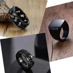 Detailed view of black stainless steel ring set featuring chain patterns and signet styles
