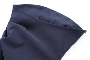 Detail of invisible zipper and fine stitching on dark blue pleated strapless top