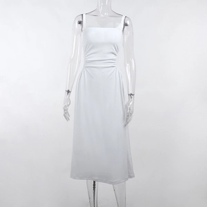 Detailed close-up of white A-line dress with smocked waist and square neckline design