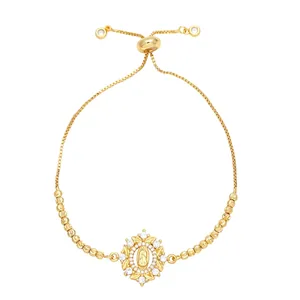 Bracelet à perles dorées réglable avec médaillon Vierge Marie et zircons brillants