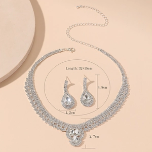 Detail view of silver rhinestone jewelry set with precise product size specifications