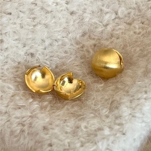 925 sterling silver golden ball earrings with matte brushed finish on plush background