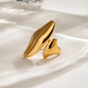 Irregular liquid style adjustable open ring in polished gold stainless steel finish