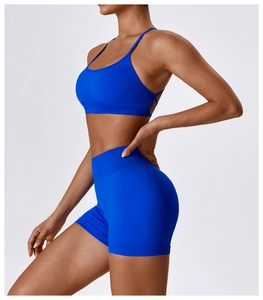 Detail of blue seamless yoga set showing ribbed waistband and tight-fit athletic texture