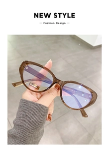 Detail of tortoise cat-eye glasses frame with model E5167 53-18-143 CE marking