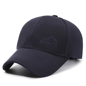 Navy blue sports baseball cap with embroidered mountain logo and curved brim profile