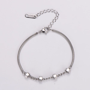 Detail of silver snake chain bracelet with square charms and 18KGP engraving mark