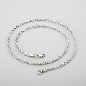 Close-up of polished silver stainless steel twist rope chain necklace for men and women