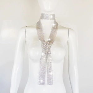 Close-up of sparkling silver sequin choker necklace and matching rhinestone scarf on mannequin