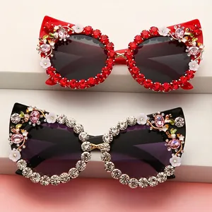 Cat-eye sunglasses with luxury rhinestones and floral 3D decorations in red and black