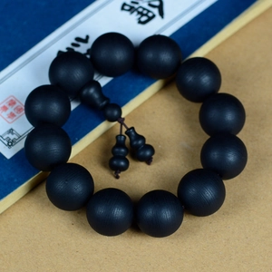 Bracelet en bois de santal avec grain de bois noir mat et pendentif gourde déco