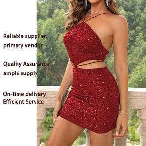 Completo sexy due pezzi in paillettes rosse con top senza schiena e gonna a tubino