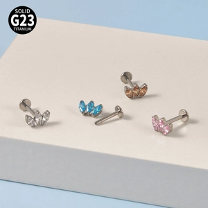 G23 titanium labret studs with three marquise crystals in silver, blue, pink, and orange