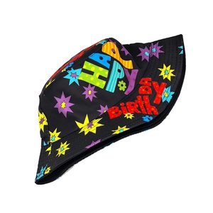 Detail of black bucket hat with colorful Happy Birthday text and star patterns