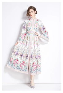 Close-up of ethnic style maxi dress with stand collar and intricate floral prints