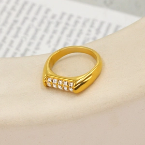 Macro shot of 18K gold plated stainless steel ring with double rows of zircon stones