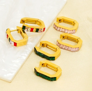 Detail view of 18K gold plated stainless steel hoop earrings with colorful zircon stones
