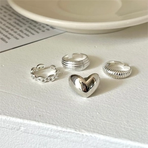 Macro shot of 925 sterling silver rings set showing the S925 hallmark on inner band