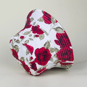 Elegant white bucket hat with vintage red rose floral print and sun protection brim