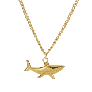 Minimalist 18k gold plated stainless steel shark pendant necklace on white background