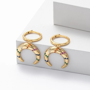 Macro shot of S925 sterling silver crescent moon earrings with colorful pavé zircon stones