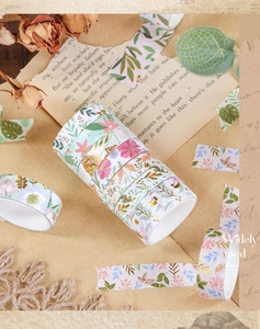 Close-up of floral washi tape set with gold foil accents for vintage scrapbooking