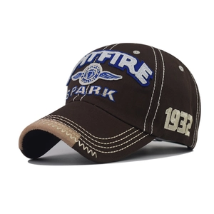 Detail of vintage brown cotton baseball cap with SPARK 1932 3D embroidery and suede brim