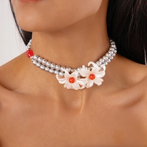 Elegant double-layered glass pearl necklace with red beads and white resin flower