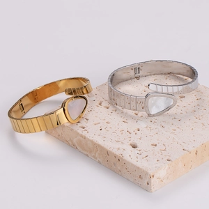 Retro stainless steel snake bracelets with white shell inlay in gold and silver finish