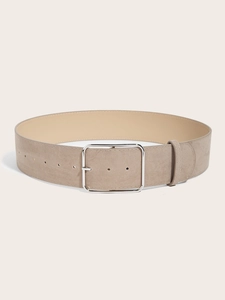 Detail of taupe suede wide belt featuring a polished silver square metal pin buckle