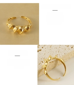Detailed view of adjustable irregular twisted gold stainless steel ring for women