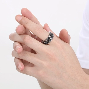 Vintage punk silver skull ring for men, crafted in stainless steel with a distressed finish