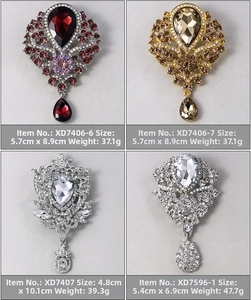 Detailed size and weight specs for vintage teardrop crystal brooches with diamond accents