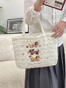 Quilted heart pattern tote bag with cute dog embroidery and stylish top handles