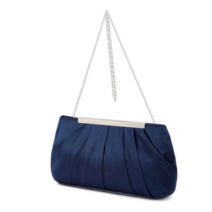 Detail of navy blue pleated satin clutch bag with silver chain and metal clasp closure