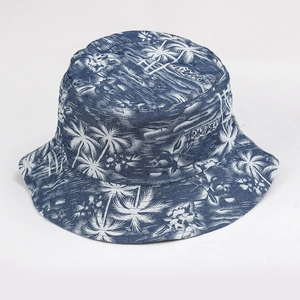 Detail of blue denim bucket hat with white palm trees, waves and Hawaii print
