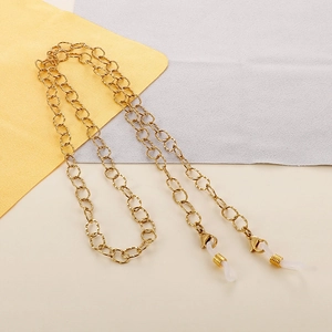Detail of gold titanium steel glasses chain with non-slip silicone loops and metal links